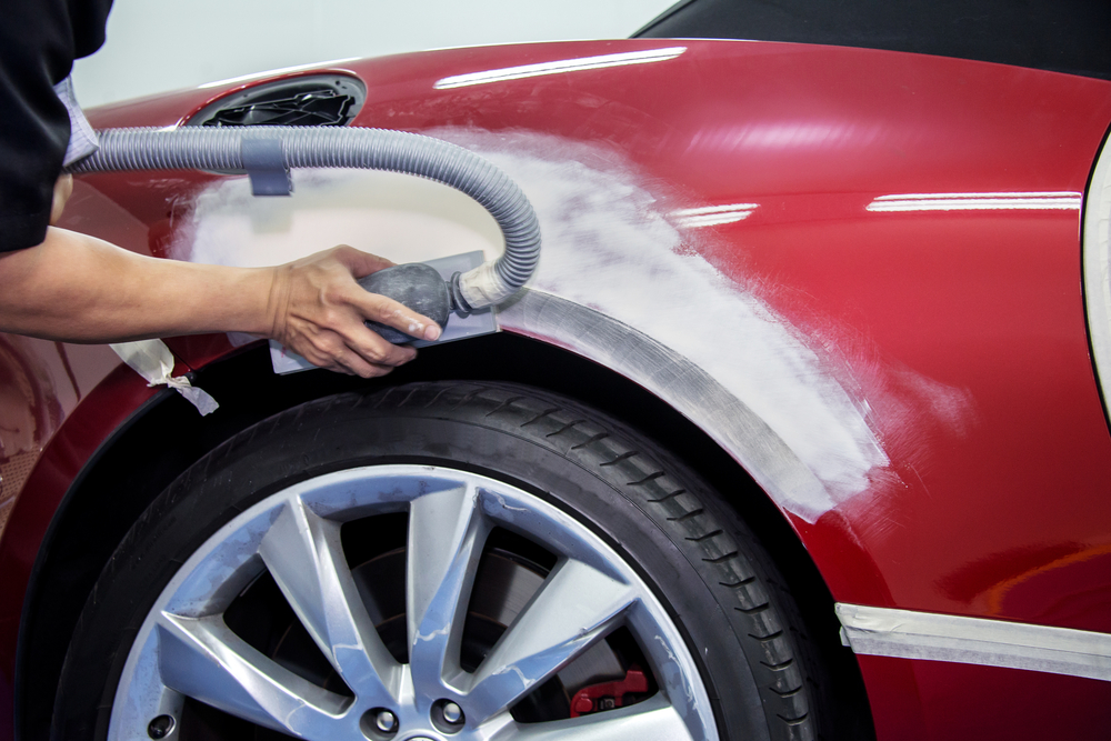 mechanic,worker,repairman,fixing,by,sanding,polishing,car,body,and